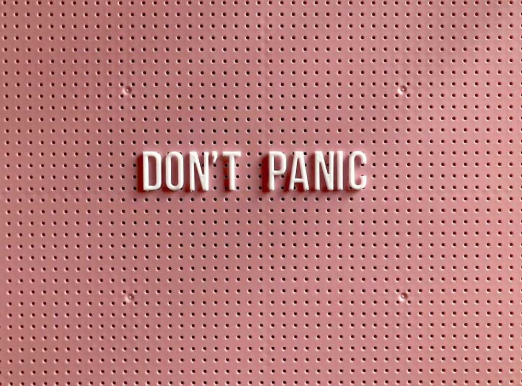 The pink background with the text saying, "Don't panic"